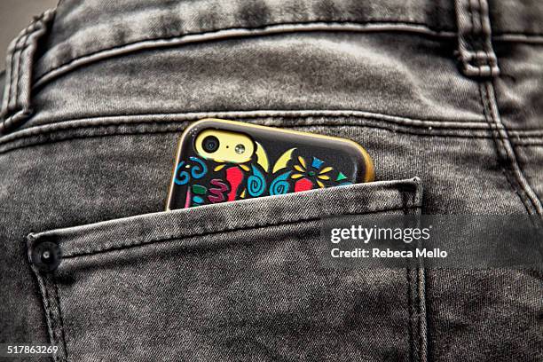 pocket phone - back pocket stock pictures, royalty-free photos & images