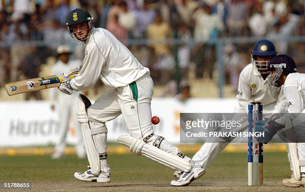 South African Captain Graeme Smith plays a stroke, during the fifth and final day of the first Test match between India and South Africa at the Green...