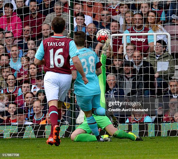 Taylor Tombides scores for the All-Stars during the Mark Noble Testimonial match between West Ham United XI and West Ham United All-Stars XI at...