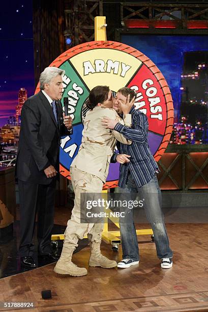 Episode 3148 -- Pictured: Host Jay Leno with singer Elliot Yamin during "Wheel of Consolation" on May 18, 2006 --