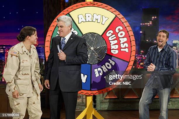 Episode 3148 -- Pictured: Host Jay Leno with singer Elliot Yamin during "Wheel of Consolation" on May 18, 2006 --