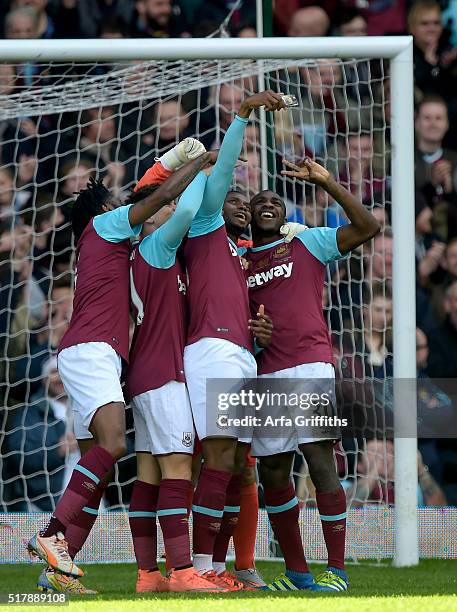 Diafra Sakho of West Ham United takes a selfie on the pitch to celebrate after scoring in the West Ham United XI v West Ham United All Stars XI: Mark...