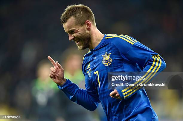 Andriy Yarmolenko of Ukraine celebrates as he scores the opening goal during the International Friendly match between Ukraine and Wales at NSK...