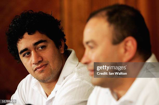 Wallabies Centre, Morgan Turinui watches on as Coach, Eddie Jones talks to the media of Australia during the press conference at the Royal Garden...