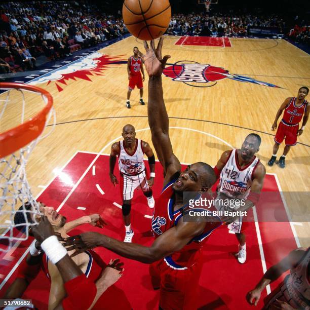 Chris Webber of the Washington Bullets drives to basket for a layup against the Houston Rockets during the NBA game in Houston, Texas. NOTE TO USER:...