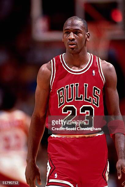Michael Jordan of the Chicago Bulls takes a break against the Atlanta Hawks during an NBA game circa 1989 at the Omni in Atlanta, Georgia. NOTE TO...