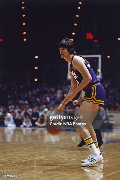 Pete Maravich of the Utah Jazz looks to make a play during an NBA game. NOTE TO USER: User expressly acknowledges and agrees that, by downloading and...