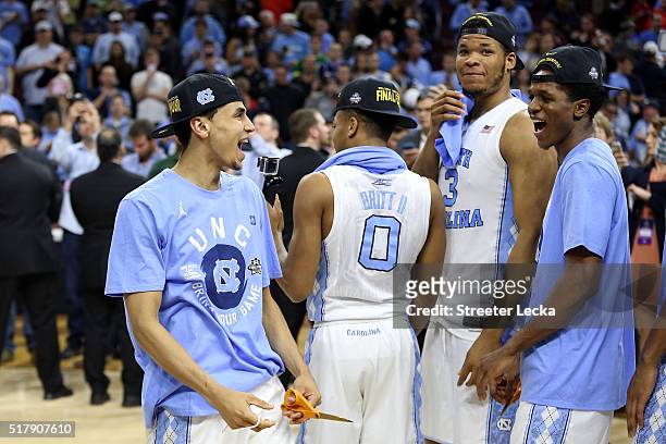 Marcus Paige of the North Carolina Tar Heels celebrates with his teammates after defeating the Notre Dame Fighting Irish during the 2016 NCAA Men's...