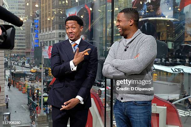 Calloway interviews Nick Cannon during his visit to "Extra" at their New York studios at H&M in Times Square on March 28, 2016 in New York City.