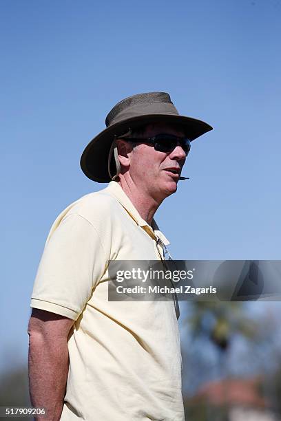 Executive Vice President of Baseball Operations Billy Beane of the Oakland Athletics stands on the field during a spring training workout at Fitch...