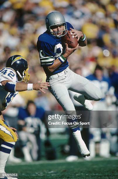 Seattle Seahawks Steve Largent jumps to catch a pass against the San Diego Chargers.