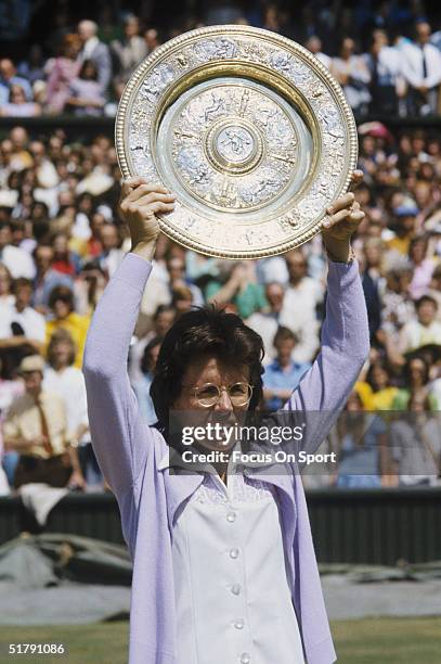 Billie Jean King holds the Wimbeldon women's singles plate after winning another Wimbeldon tennis championship in 1973 in London, England. Billie...