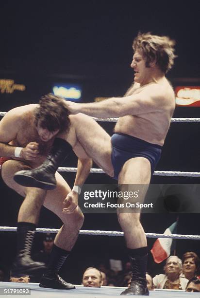 Bruno Sammartino a professional wrestler knees his opponent. Sammartino held the World Wrestling Federation Championship for more than twelve years...