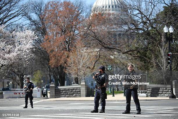 Police establish a perimeter during a lock down after shots were reportedly fired at the U.S. Capitol Visitor Center March 28, 2016 in Washington,...