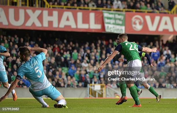 Conor Washington of Northern Ireland scores during the international friendly between Northern Ireland and Slovenia at Windsor Park on March 28, 2016...