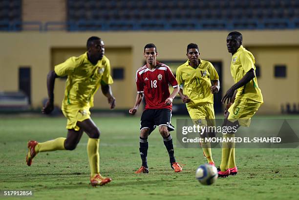 Libya's Faisal al-Badri fights for the ball against players from São Tomé and Príncipe during their qualifier match for the African Cup of Nations...