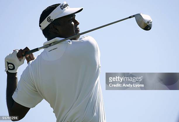 Vijay Singh of Fiji hits his tee shot on the 15th hole during the final round of the 22nd PGA Grand Slam of Golf on November 24, 2004 at the Poipu...