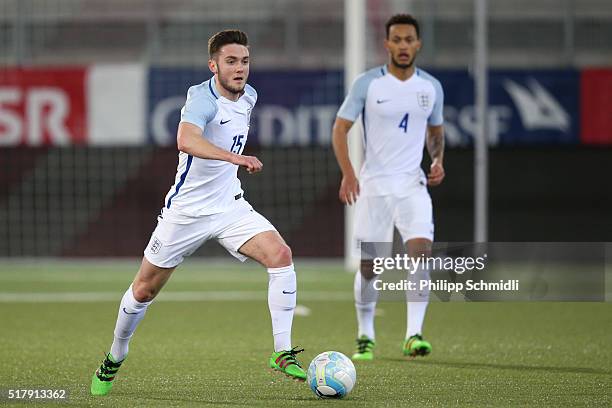 Lewis Baker of England U21 looks on as Matthew Grimes of England U21 runs with the ball during the European Under 21 Qualifier match between...