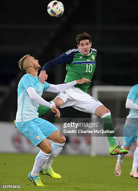 Kyle Lafferty of Northern Ireland and Struna Aljaz of Slovenia during the international friendly between Northern Ireland and Slovenia at Windsor...