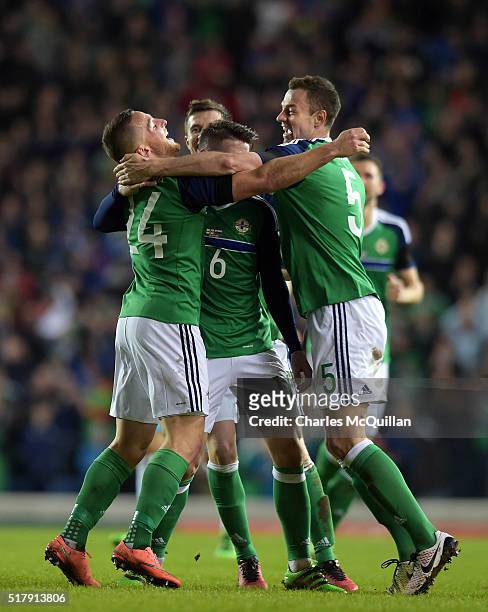 Conor Washington of Northern Ireland celebrates with teammates after scoring during the international friendly between Northern Ireland and Slovenia...