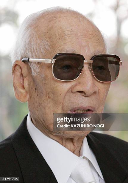 Momofuku Ando founder of Japan's Nissin Food Products Co., attends an opening ceremony at the refurbished Instant Ramen Museum in Osaka, 25 November...