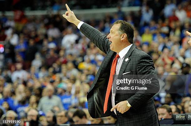 Head coach Mark Gottfried of the North Carolina State Wolfpack watches the game against the Duke Blue Devils in the second round of the 2016 ACC...