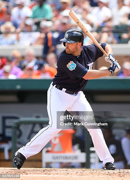 Nate Schierholtz of the Detroit Tigers bats during the Spring Training game against the Washington Nationals at Joker Marchant Stadium on March 20,...