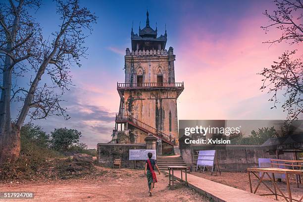 dusk of watchtower inside inwa after sunset - myanmar war stock pictures, royalty-free photos & images