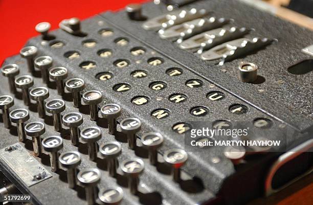 The World War II Enigma decoding machine is seen 25 November 2004 at Bletchley Park, home of the WWII codebreakers. A team of code breakers from the...