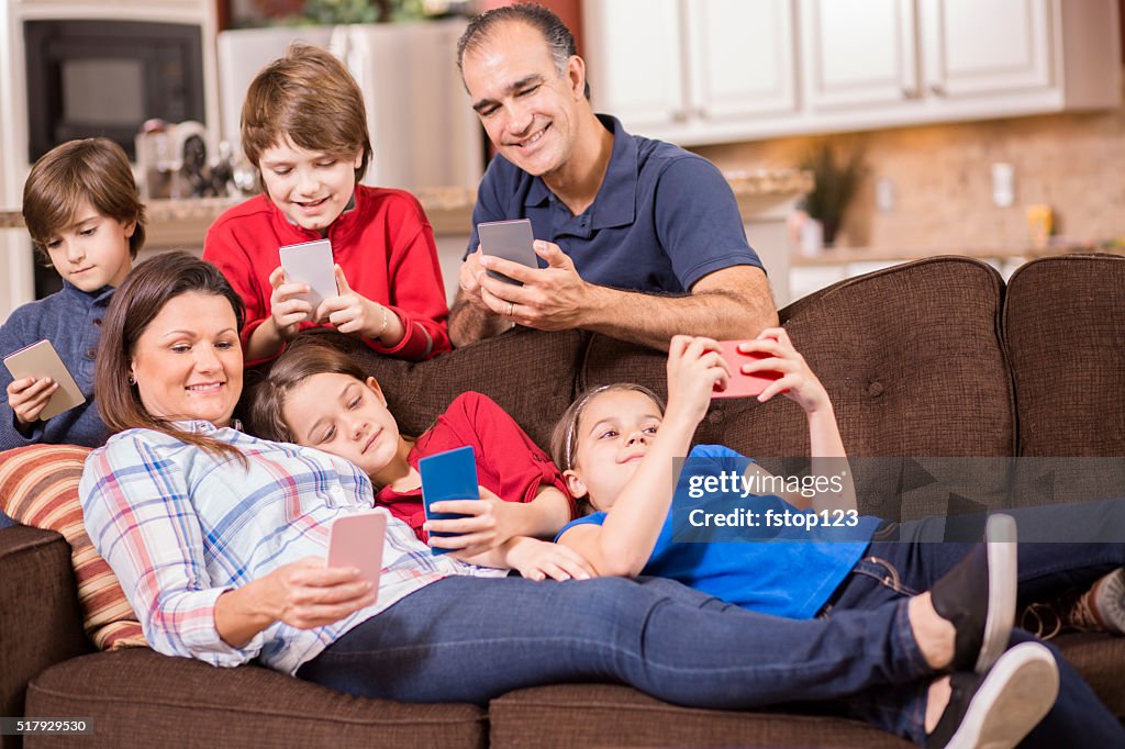 Using Phones In House Family Using Cell Phones At Home Children Parents Technology High-Res ...