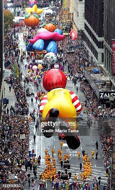 Giant balloons float down Broadway during the 78th Annual Macy's Thanksgiving Day Parade November 25, 2004 in New York City. Thousands attended the...
