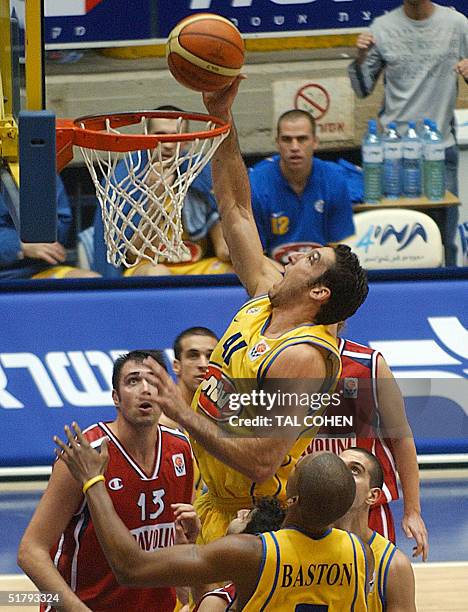 Maccabi Tel Aviv's Yariv Green dunks during the Euroleague match against Italian team Scavolini Pesaro at the Yad Eliyahu stadium in Tel Aviv 25...