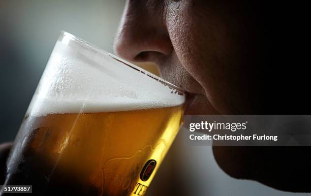 Man drinks a pint of beer on November 26, 2004 in Glasgow, Scotland. The Scottish Executive has announced a major campaign designed to call time on...