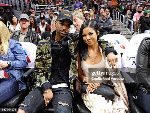 Big Sean and Jhene Aiko attend a basketball game between the Boston Celtics and the Los Angeles Clippers at Staples Center on March 28, 2016 in Los...