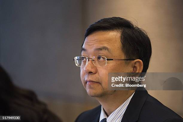 Wang Chuanfu, chairman of BYD Co., listens during a news conference in Hong Kong, China, on Tuesday, March 29, 2016. BYD has become the world's...