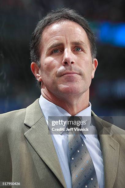 Assistant coach Doug Lidster of the Vancouver Canucks looks on from the bench during their NHL game against the Anaheim Ducks at Rogers Arena...