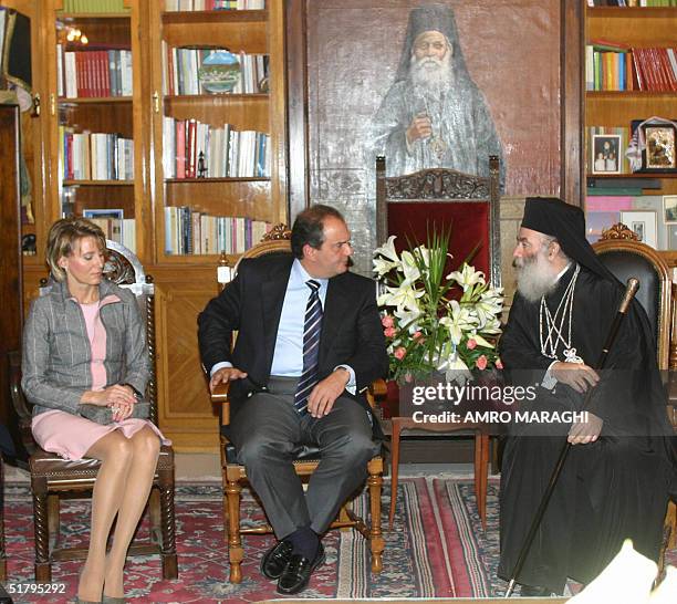 Greek Prime Minister Costas Karamanlis and his wife Natasha meet with the newly enthroned Greek Orthodox Patriarch of Alexandria and Africa, Theodore...