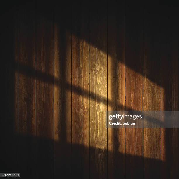 wooden background illuminated by the light from a window - window shadow texture stock illustrations