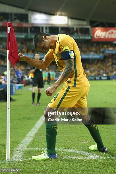 Tim Cahill of Australia celebrates scoring his second goal during the 2018 FIFA World Cup Qualification match between the Australian Socceroos and...