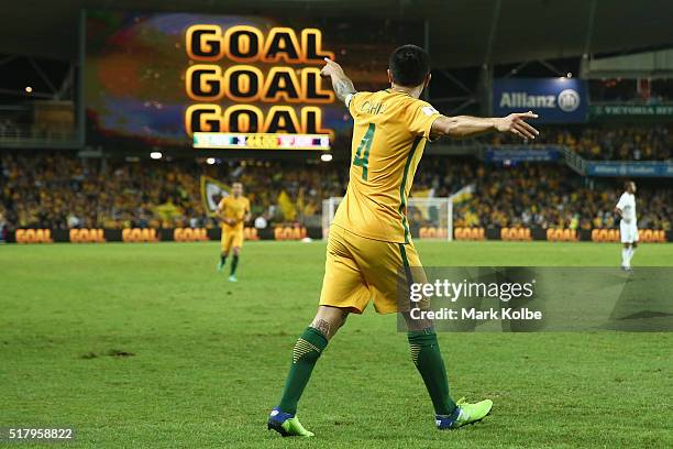 Tim Cahill of Australia celebrates scoring a goal during the 2018 FIFA World Cup Qualification match between the Australian Socceroos and Jordan at...