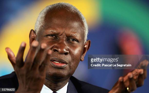 General Secretary of International Organization for Francophonie, Abdou Diouf, gestures during a press conference at the end of the 10th Francophonie...