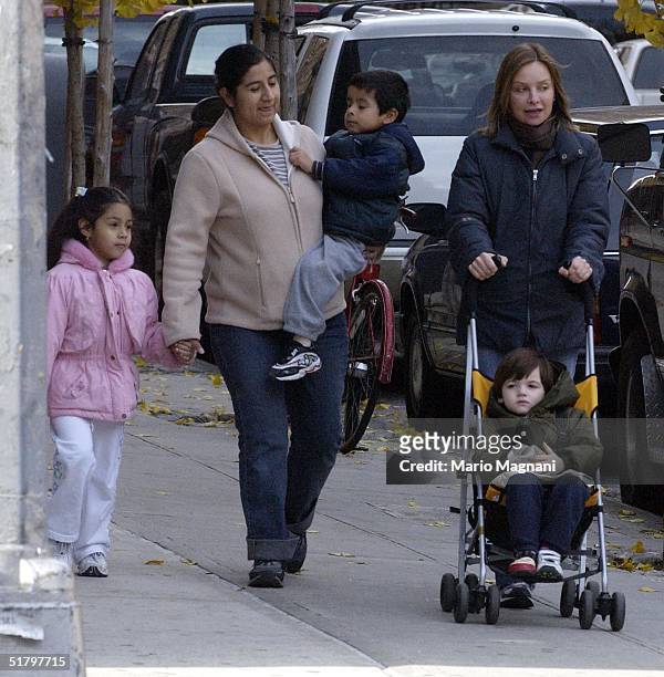 Calista Flockhart shops in Tribeca with her son Liam on November 27, 2004 in New York City.