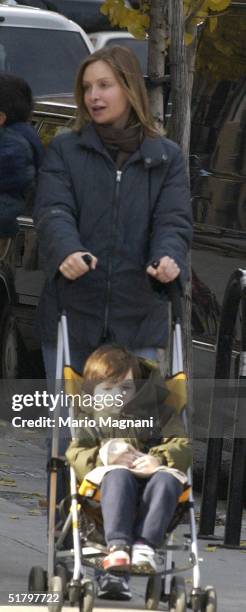 Calista Flockhart shops in Tribeca with her son Liam on November 27, 2004 in New York City.