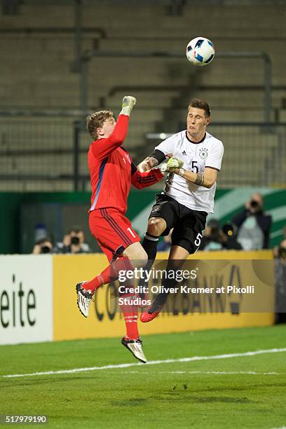 Goal Keeper Elias Rasmussen of Faeroer Islands parading a pass with the fist at Frankfurter Volksbank-Stadion during the international football match...