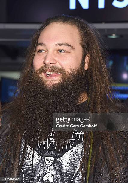 Wrestler Bray Wyatt poses for a picture prior to ringing the New York Stock Exchange opening bell in honor of WrestleMania 32 at New York Stock...