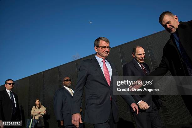 Secretary of Defense Ash Carter and U.S. Secretary of Veterans Affairs Robert McDonald arrive for a wreath laying ceremony to commemorate the 50th...