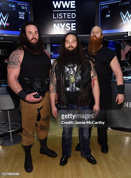 Superstars Braun Strowman, Bray Wyatt and Erick Rowan ring The New York Stock Exchange Opening Bell in honor of WrestleMania 32 at New York Stock...