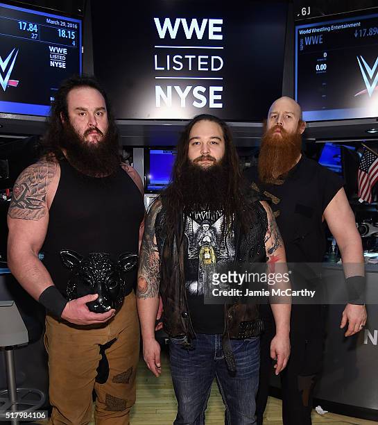 Superstars Braun Strowman, Bray Wyatt and Erick Rowan ring The New York Stock Exchange Opening Bell in honor of WrestleMania 32 at New York Stock...