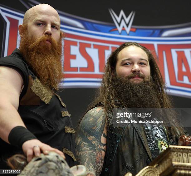 Professional wrestlers Erick Rowan and Bray Wyatt attend WWE WrestleMania Stars Ring The NYSE Opening Bell at New York Stock Exchange on March 29,...