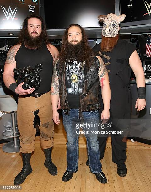 Professional wrestlers Braun Strowman, Bray Wyatt and Erick Rowan attend WWE WrestleMania Stars Ring The NYSE Opening Bell at New York Stock Exchange...